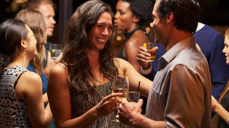 people-cheering-each-other-with-a-drink